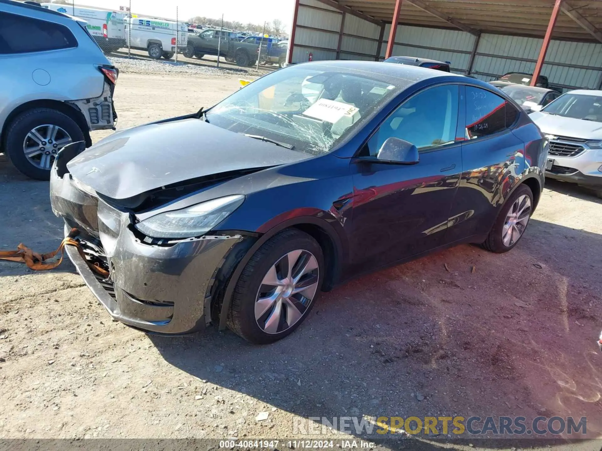 2 fotografías del automóvil dañado 7SAYGAEE9NF398040 TESLA MODEL Y 2022