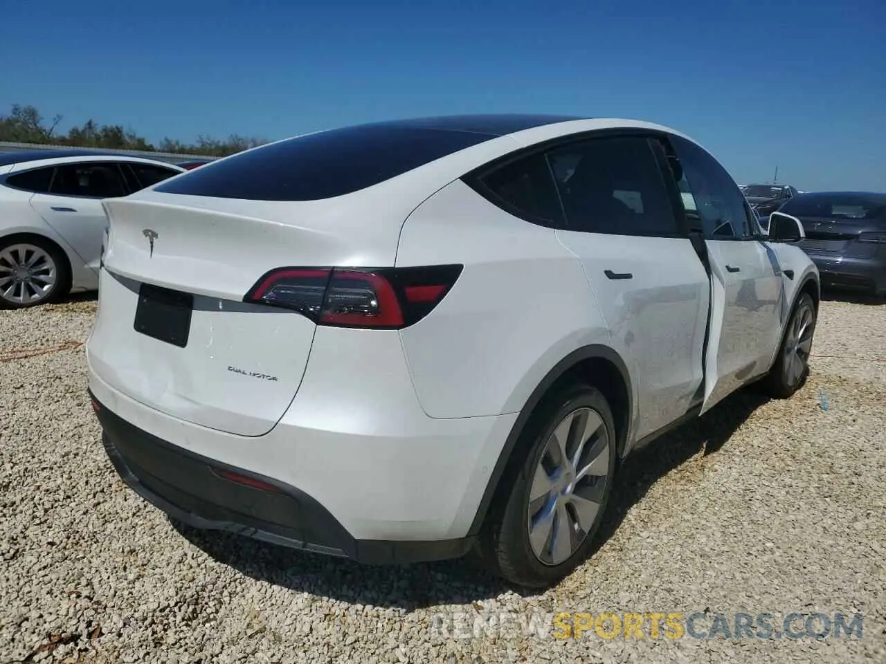 4 fotografías del automóvil dañado 7SAYGDEE2NF317123 TESLA MODEL Y 2022