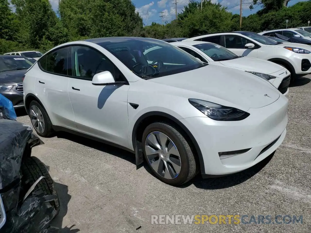 4 fotografías del automóvil dañado 7SAYGDEE2NF390993 TESLA MODEL Y 2022