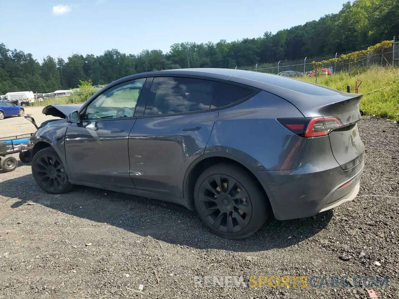 2 fotografías del automóvil dañado 7SAYGDEE3NA009004 TESLA MODEL Y 2022