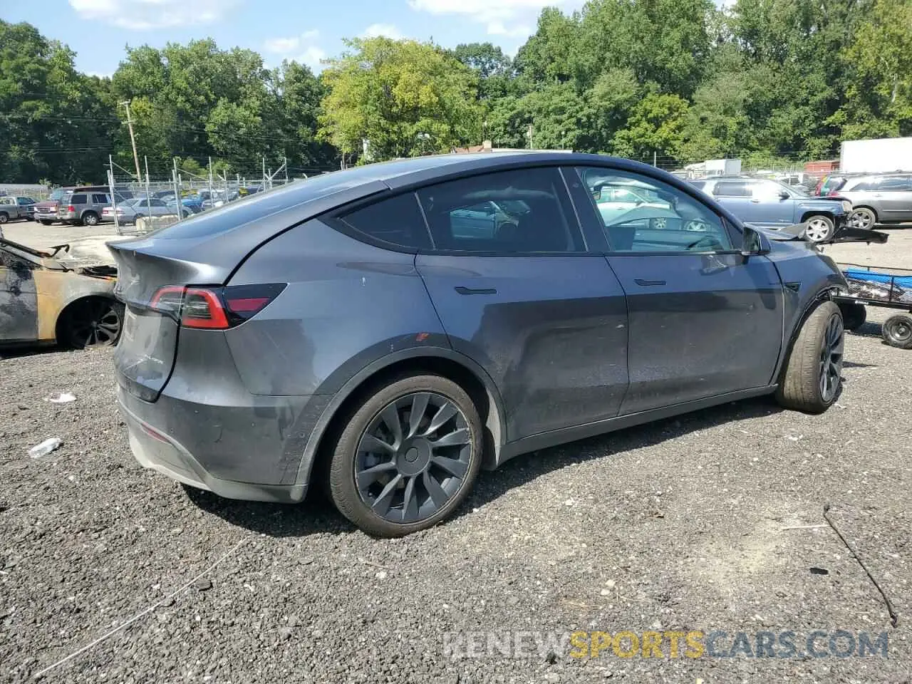 3 fotografías del automóvil dañado 7SAYGDEE3NA009004 TESLA MODEL Y 2022
