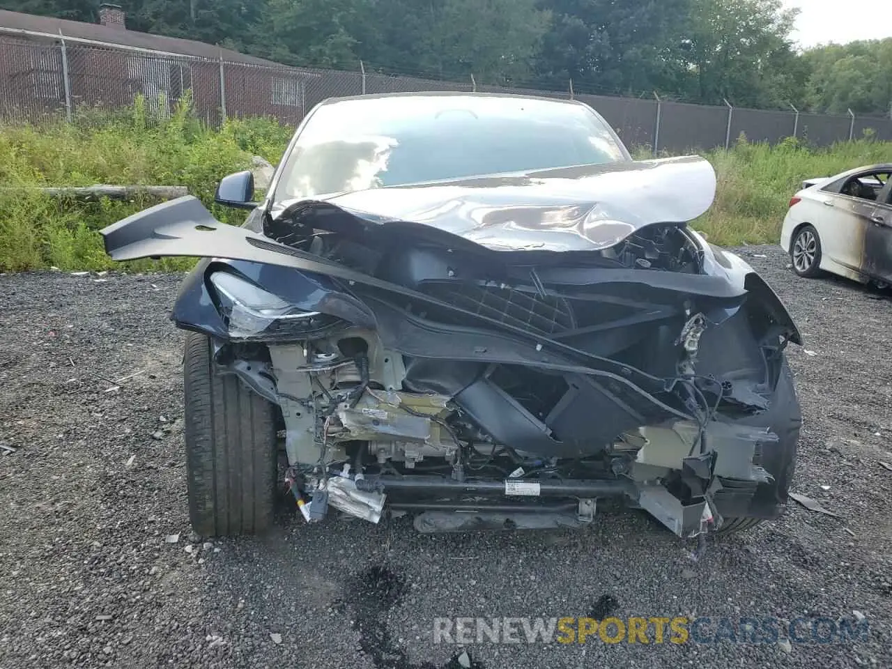 5 fotografías del automóvil dañado 7SAYGDEE3NA009004 TESLA MODEL Y 2022