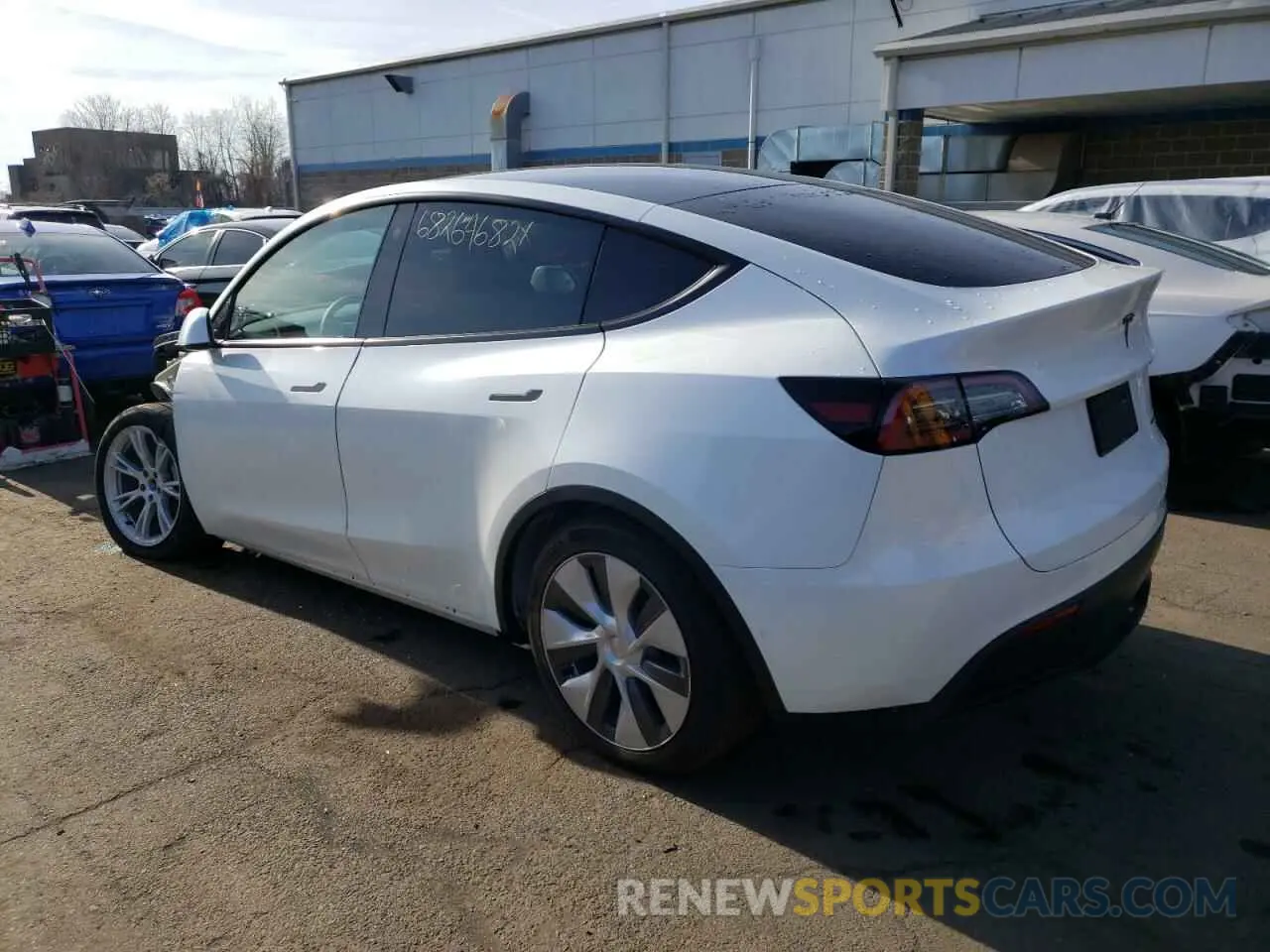 2 fotografías del automóvil dañado 7SAYGDEE3NA010086 TESLA MODEL Y 2022