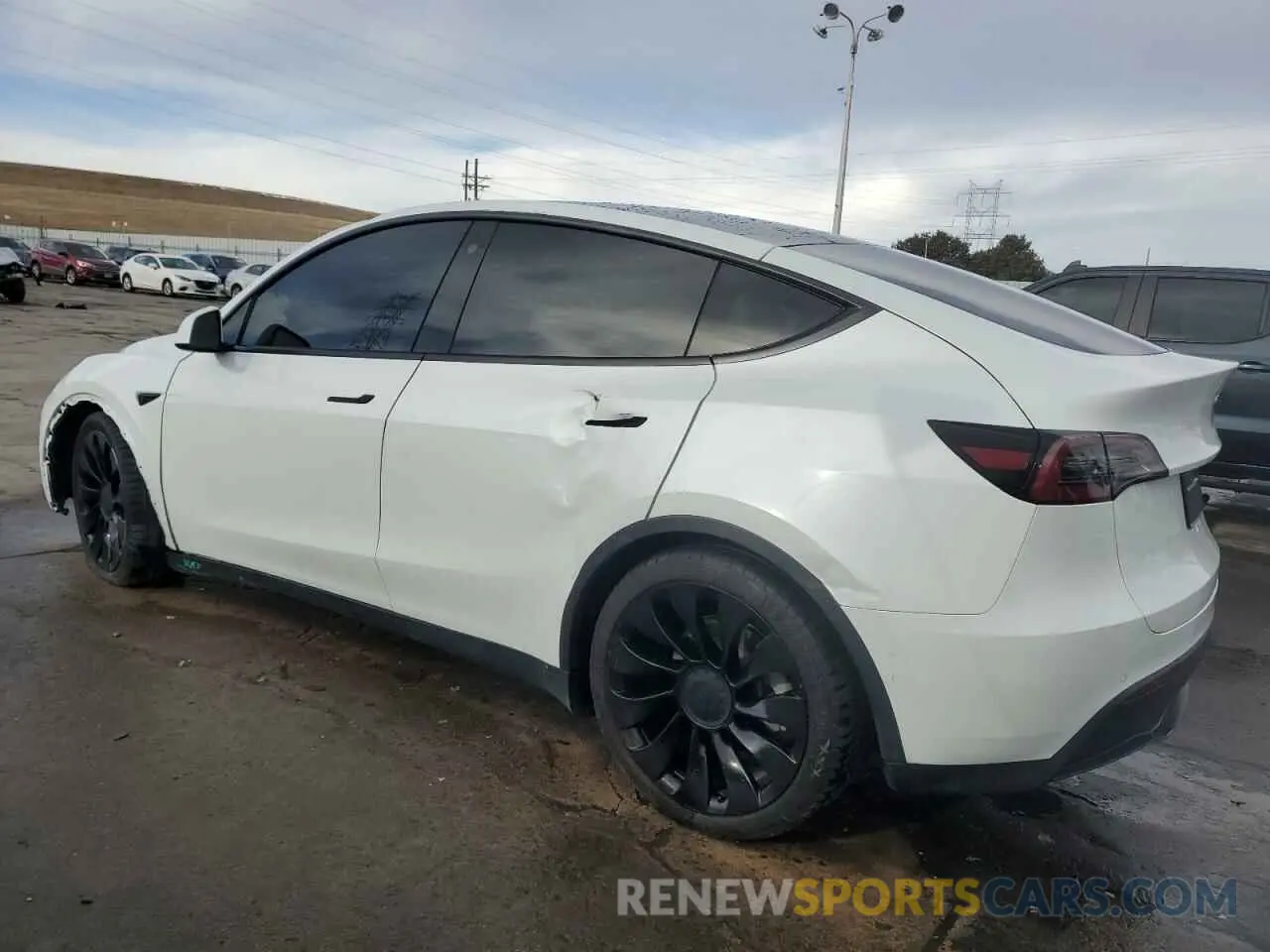 2 fotografías del automóvil dañado 7SAYGDEE3NF310150 TESLA MODEL Y 2022