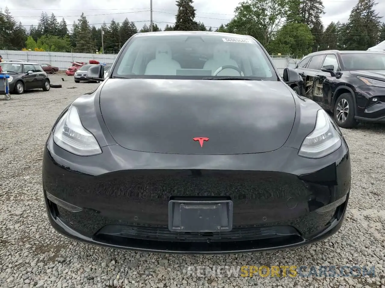 5 fotografías del automóvil dañado 7SAYGDEE3NF315249 TESLA MODEL Y 2022