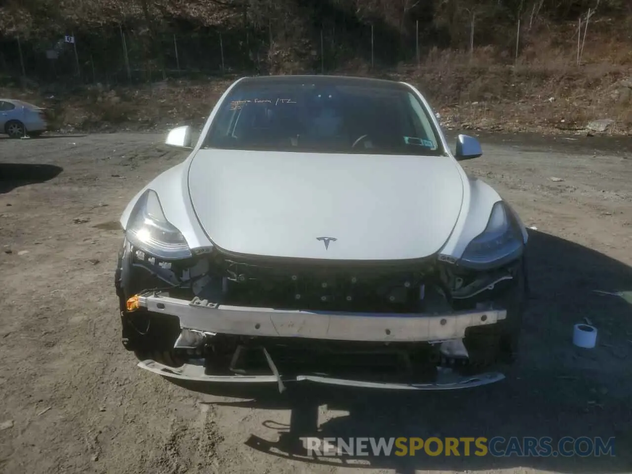5 fotografías del automóvil dañado 7SAYGDEE3NF385950 TESLA MODEL Y 2022
