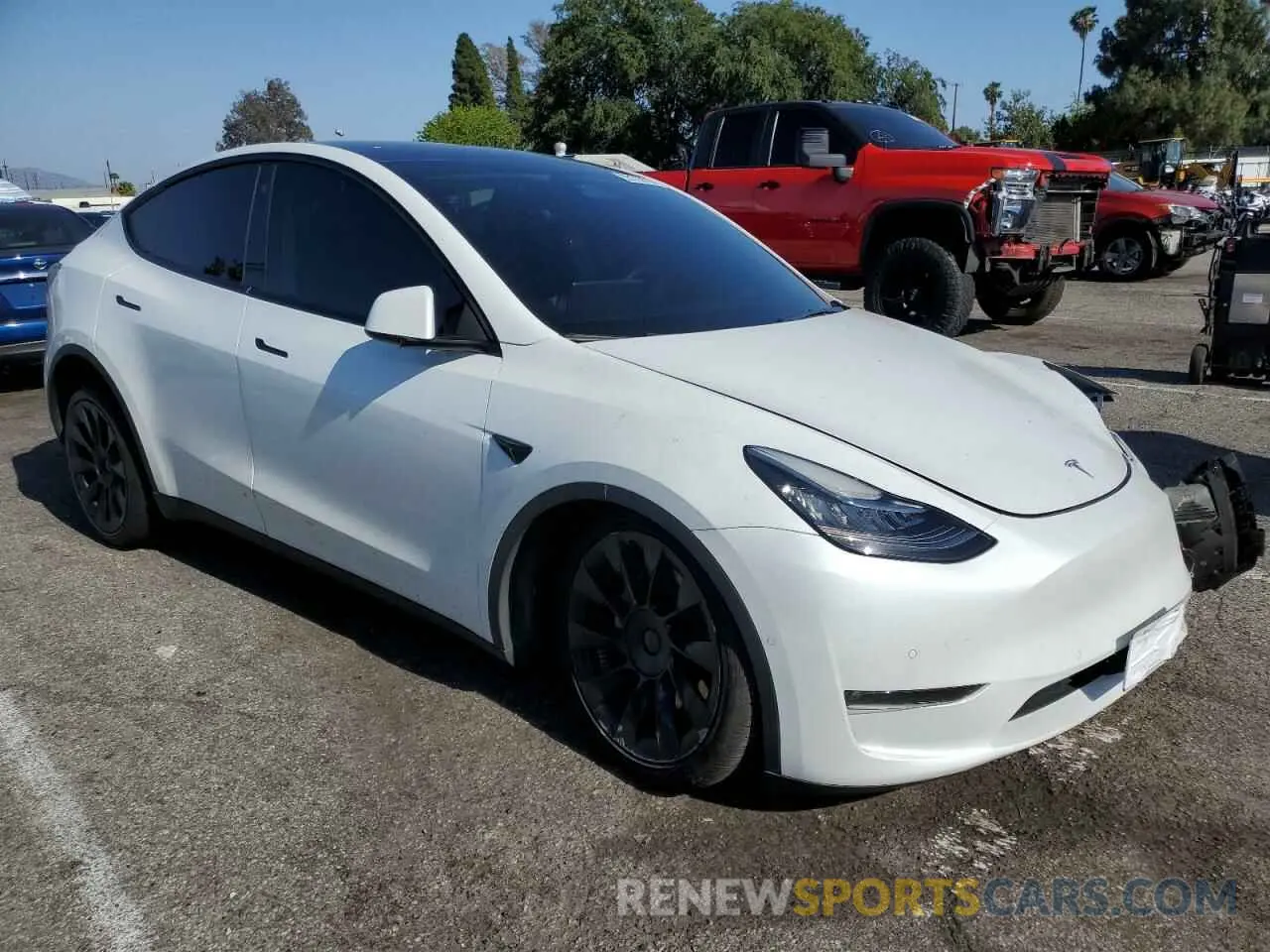 4 fotografías del automóvil dañado 7SAYGDEE3NF424259 TESLA MODEL Y 2022