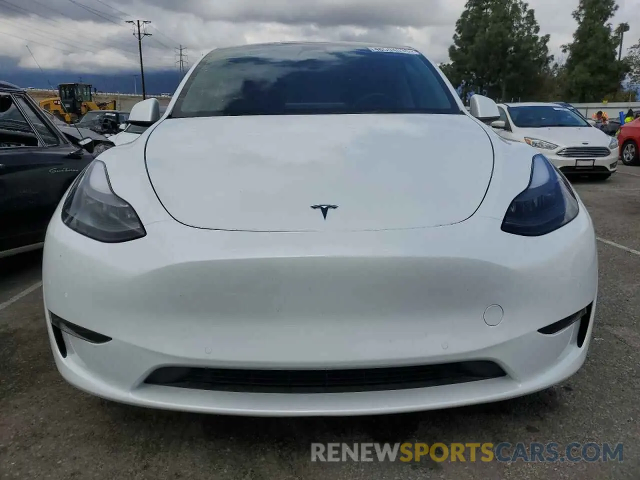 5 fotografías del automóvil dañado 7SAYGDEE3NF558379 TESLA MODEL Y 2022