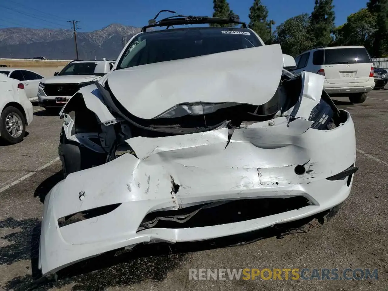 5 fotografías del automóvil dañado 7SAYGDEE4NF357428 TESLA MODEL Y 2022
