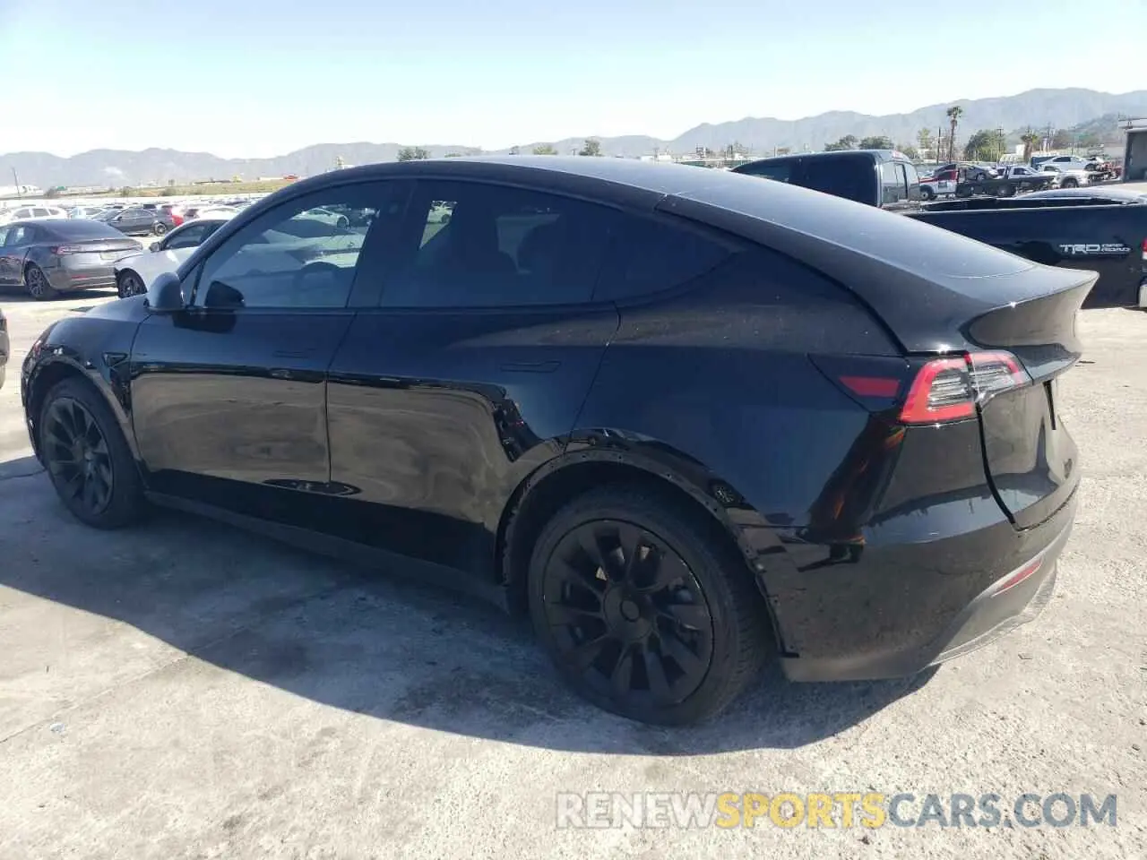 2 fotografías del automóvil dañado 7SAYGDEE4NF481120 TESLA MODEL Y 2022