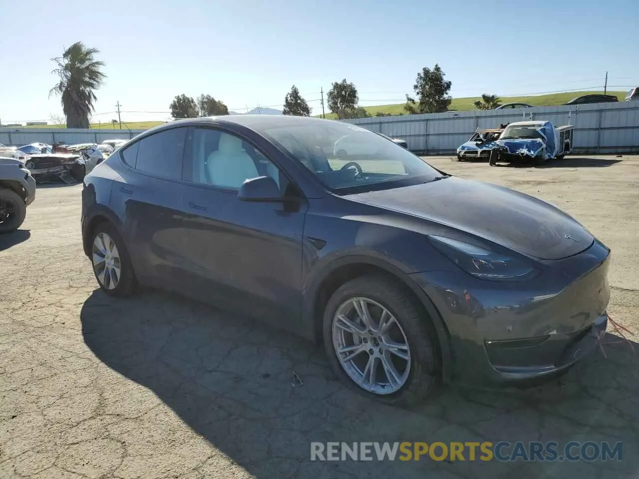 4 fotografías del automóvil dañado 7SAYGDEE5NF553071 TESLA MODEL Y 2022