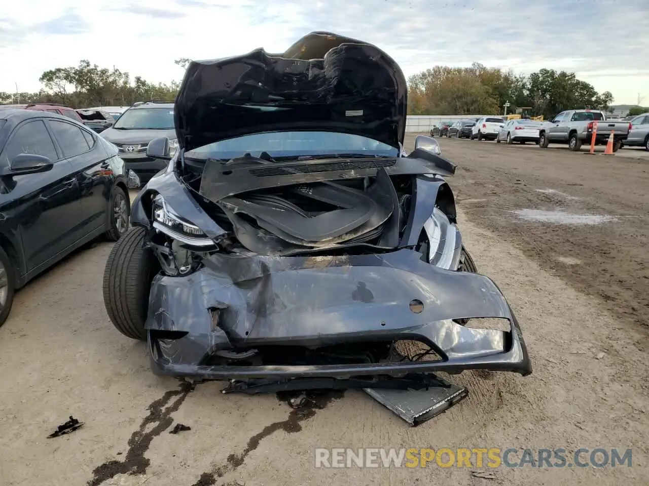 5 fotografías del automóvil dañado 7SAYGDEE6NF480499 TESLA MODEL Y 2022