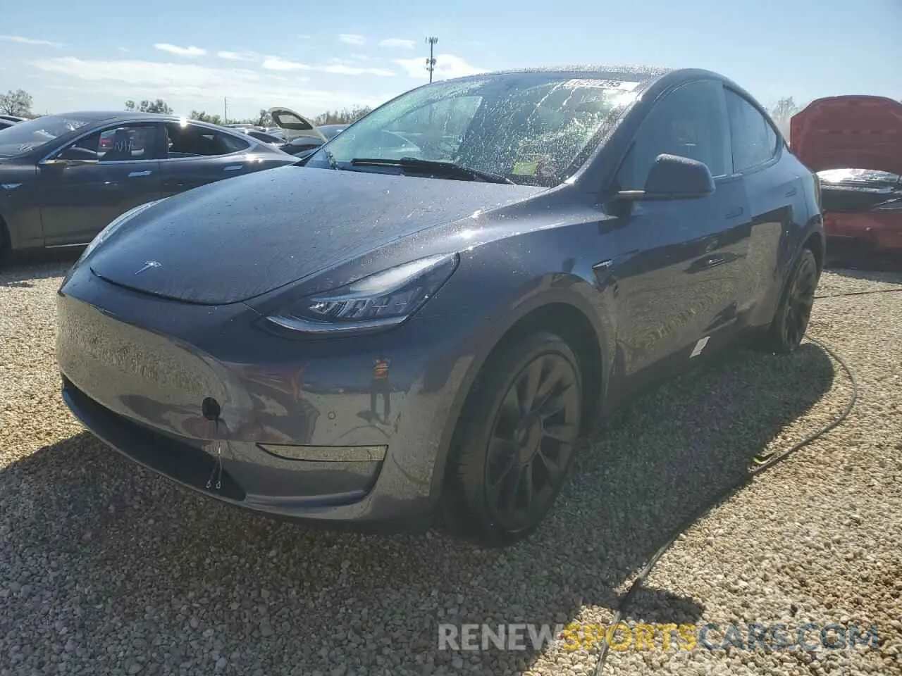 2 fotografías del automóvil dañado 7SAYGDEE7NA005943 TESLA MODEL Y 2022