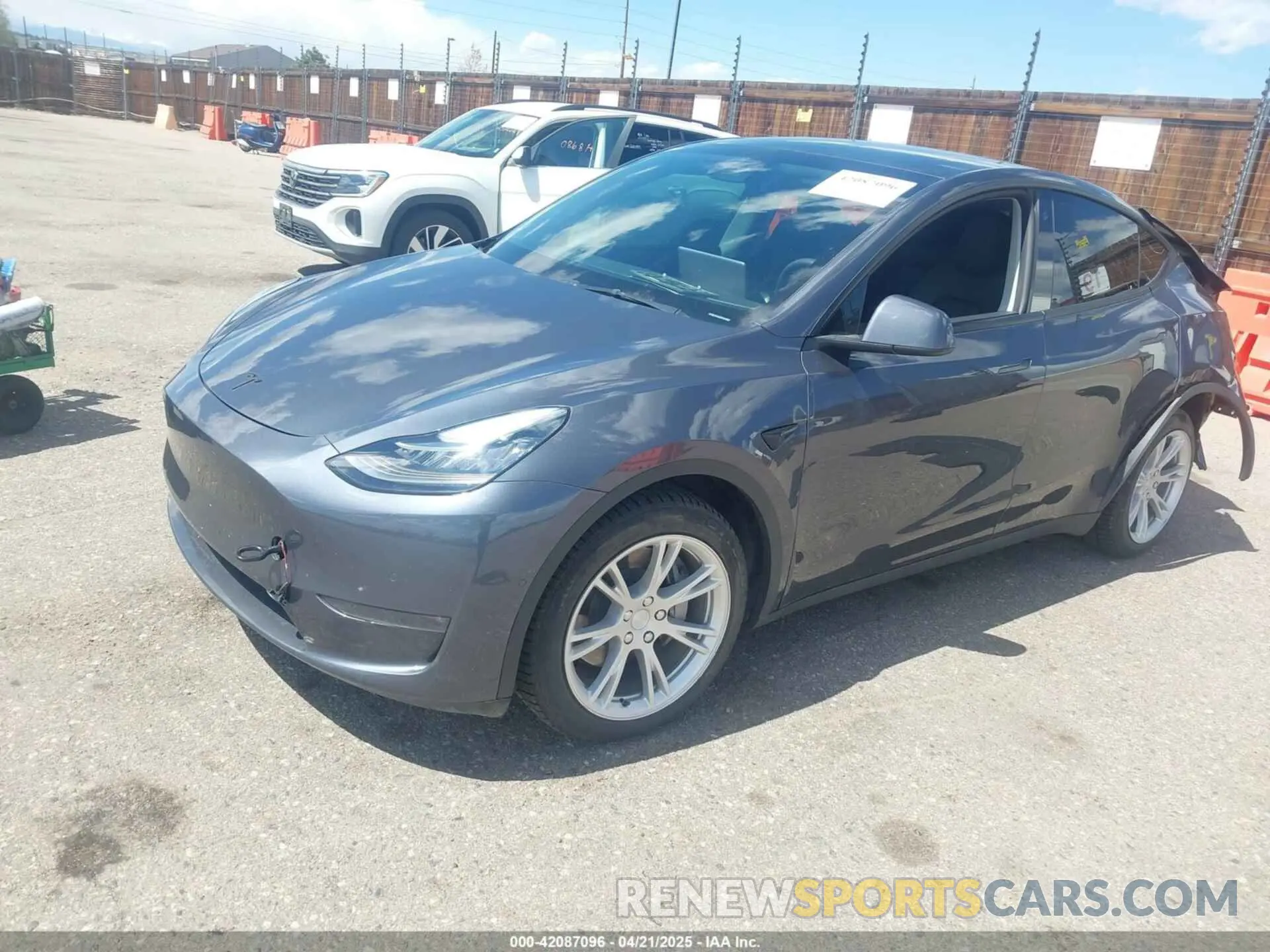 2 fotografías del automóvil dañado 7SAYGDEE7NA008860 TESLA MODEL Y 2022
