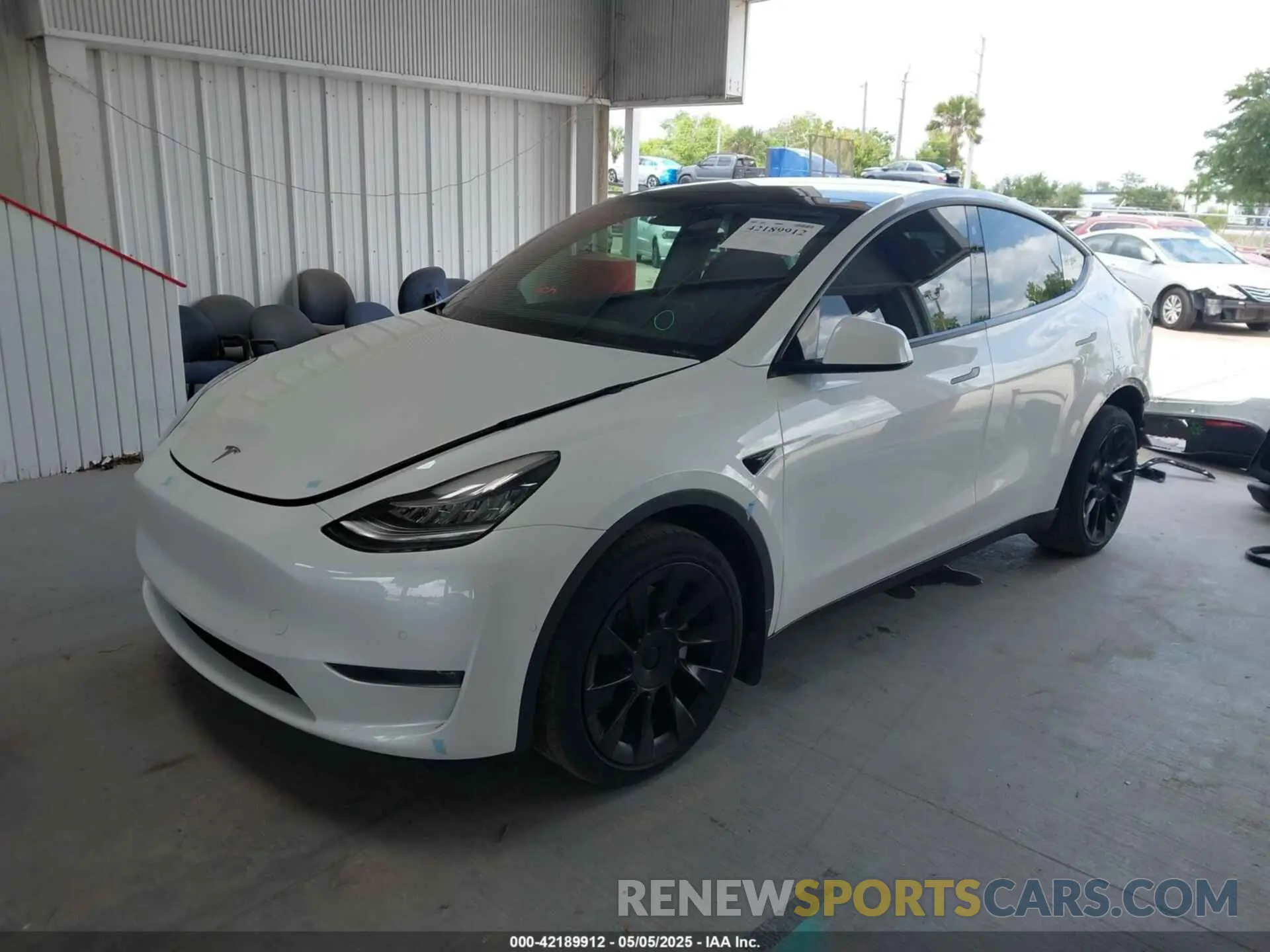 2 fotografías del automóvil dañado 7SAYGDEE7NF460942 TESLA MODEL Y 2022