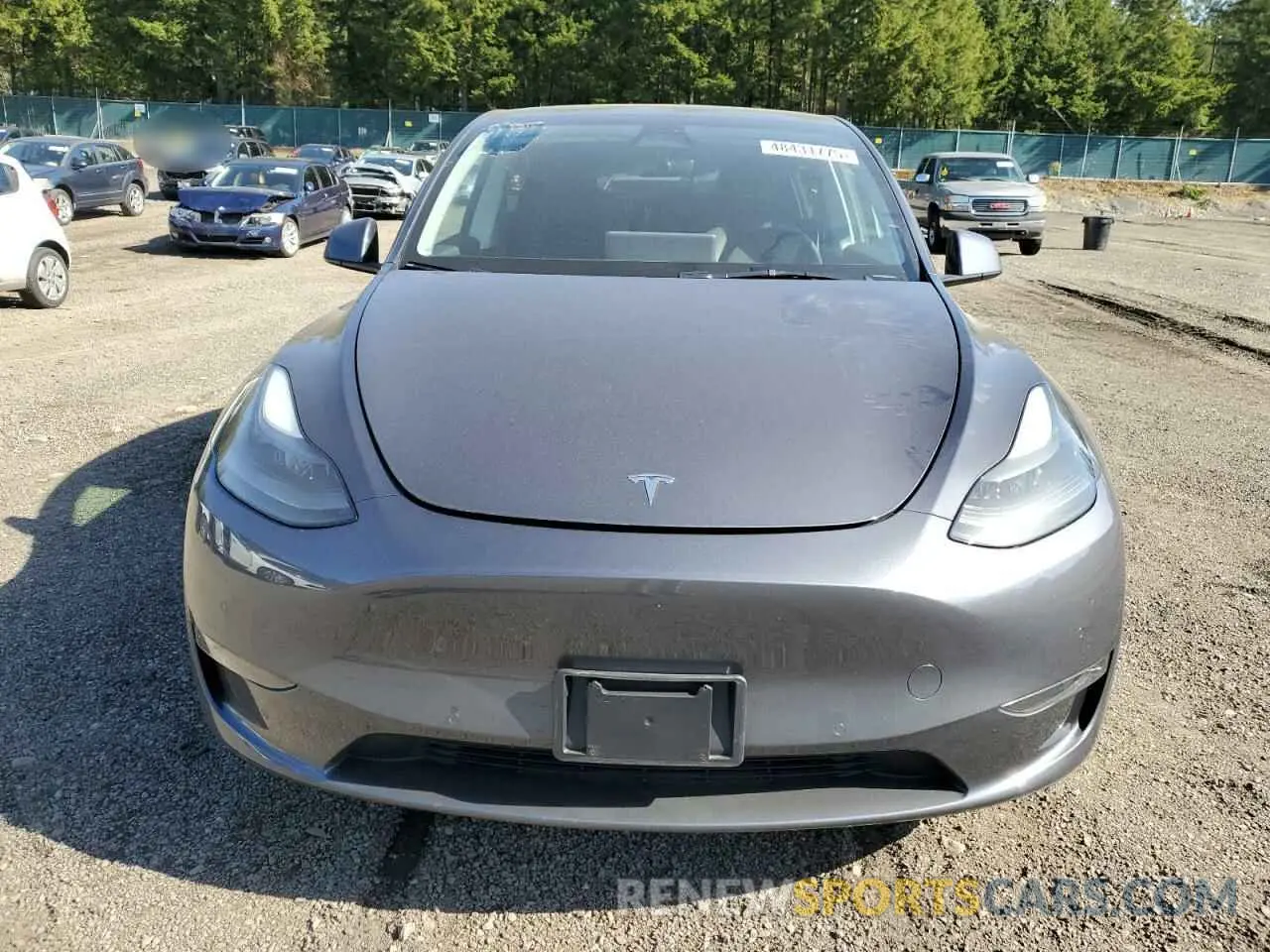 5 fotografías del automóvil dañado 7SAYGDEE8NF518847 TESLA MODEL Y 2022