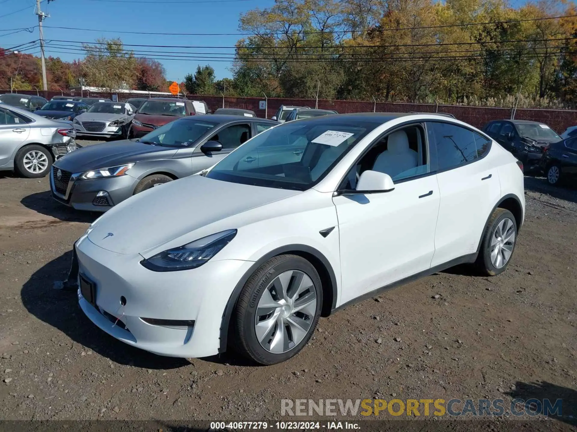 2 fotografías del automóvil dañado 7SAYGDEE9NF310377 TESLA MODEL Y 2022
