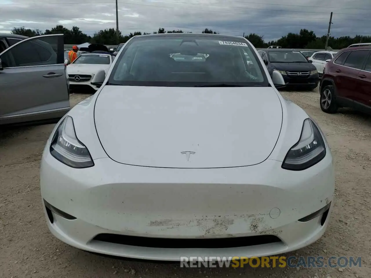 5 fotografías del automóvil dañado 7SAYGDEE9NF460196 TESLA MODEL Y 2022