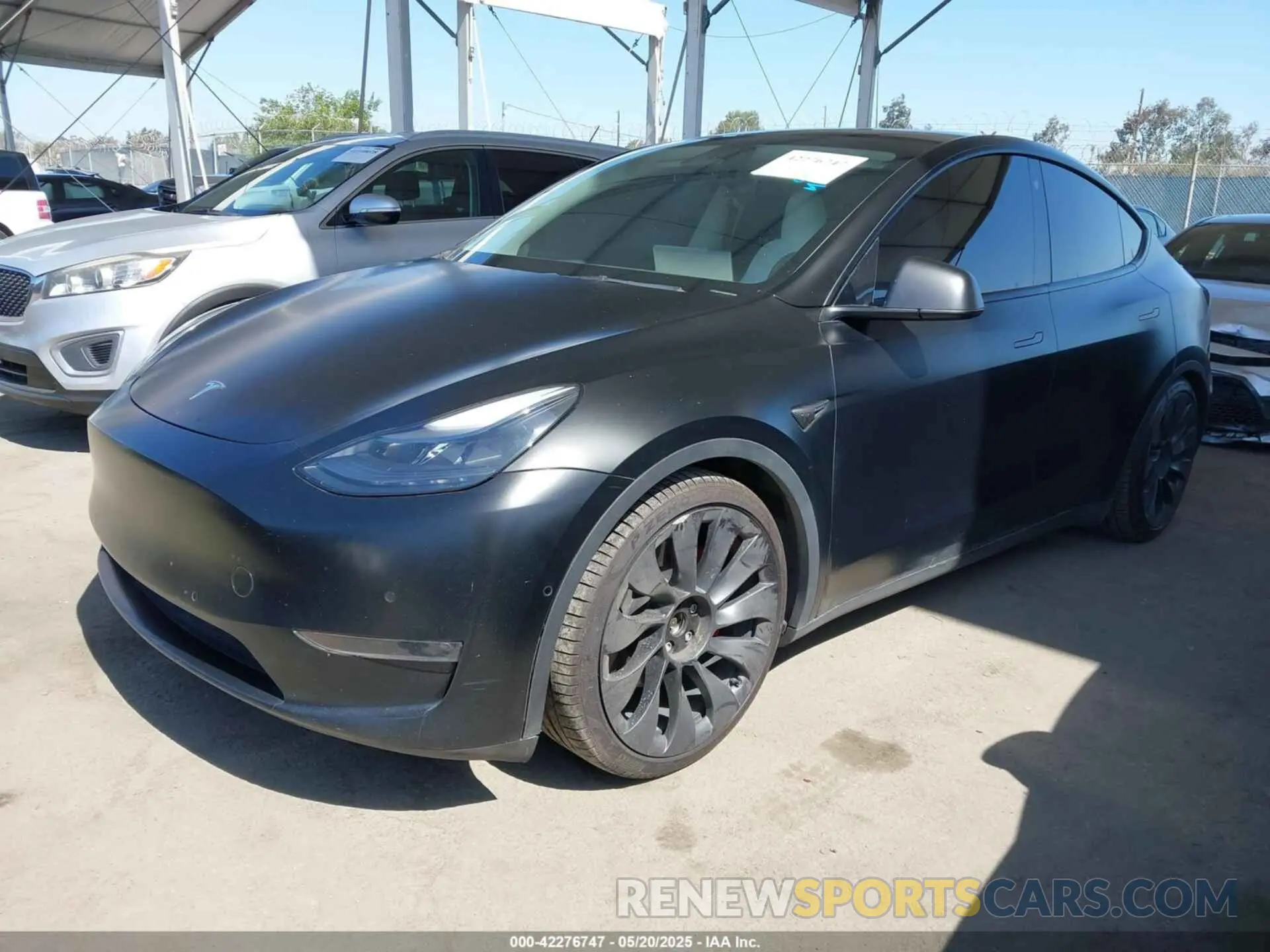 2 fotografías del automóvil dañado 7SAYGDEF0NF491586 TESLA MODEL Y 2022