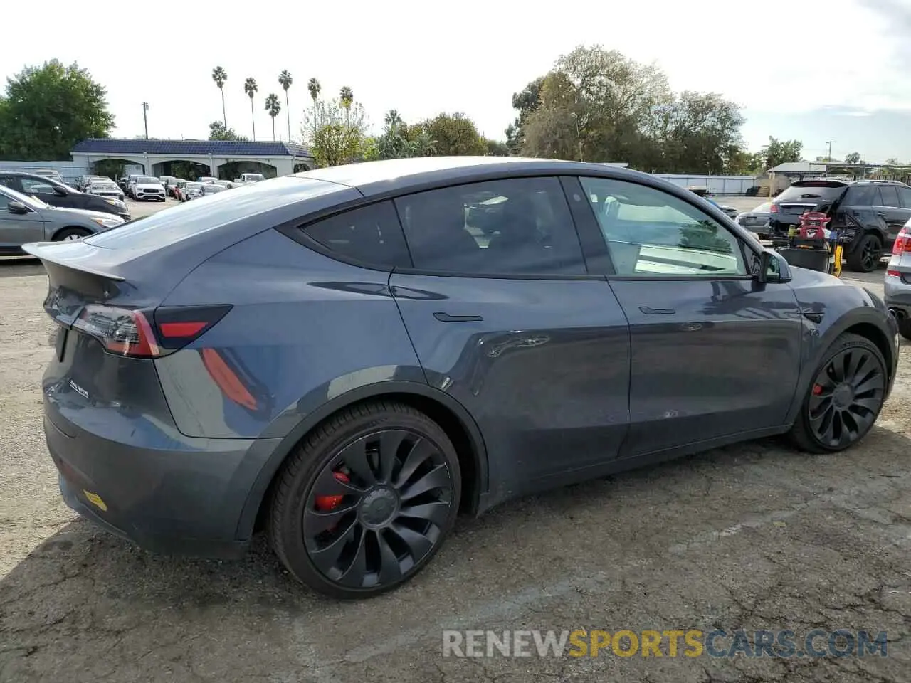 3 fotografías del automóvil dañado 7SAYGDEF1NF409526 TESLA MODEL Y 2022