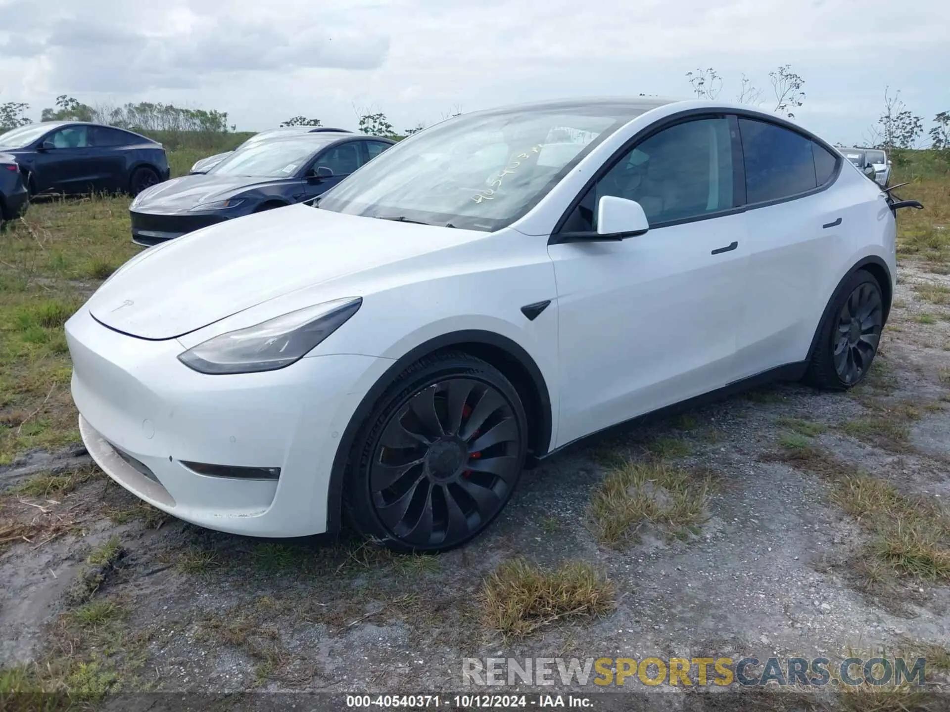 2 fotografías del automóvil dañado 7SAYGDEF2NF327711 TESLA MODEL Y 2022