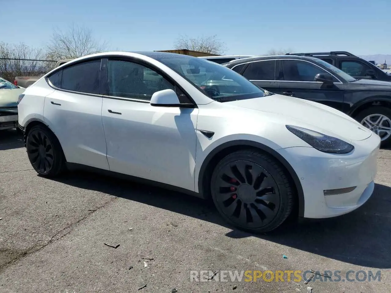 4 fotografías del automóvil dañado 7SAYGDEF2NF407736 TESLA MODEL Y 2022