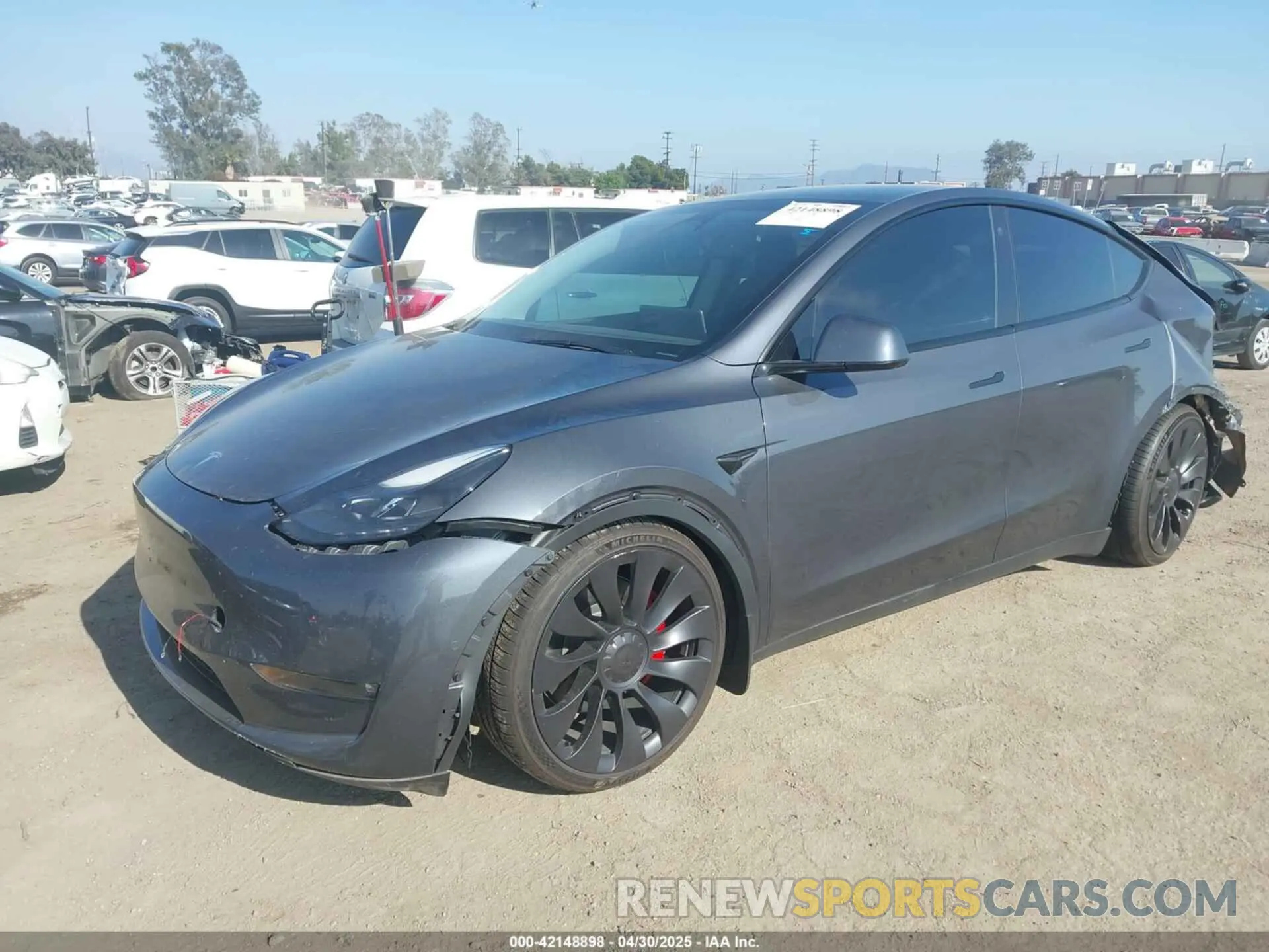 2 fotografías del automóvil dañado 7SAYGDEF2NF543493 TESLA MODEL Y 2022