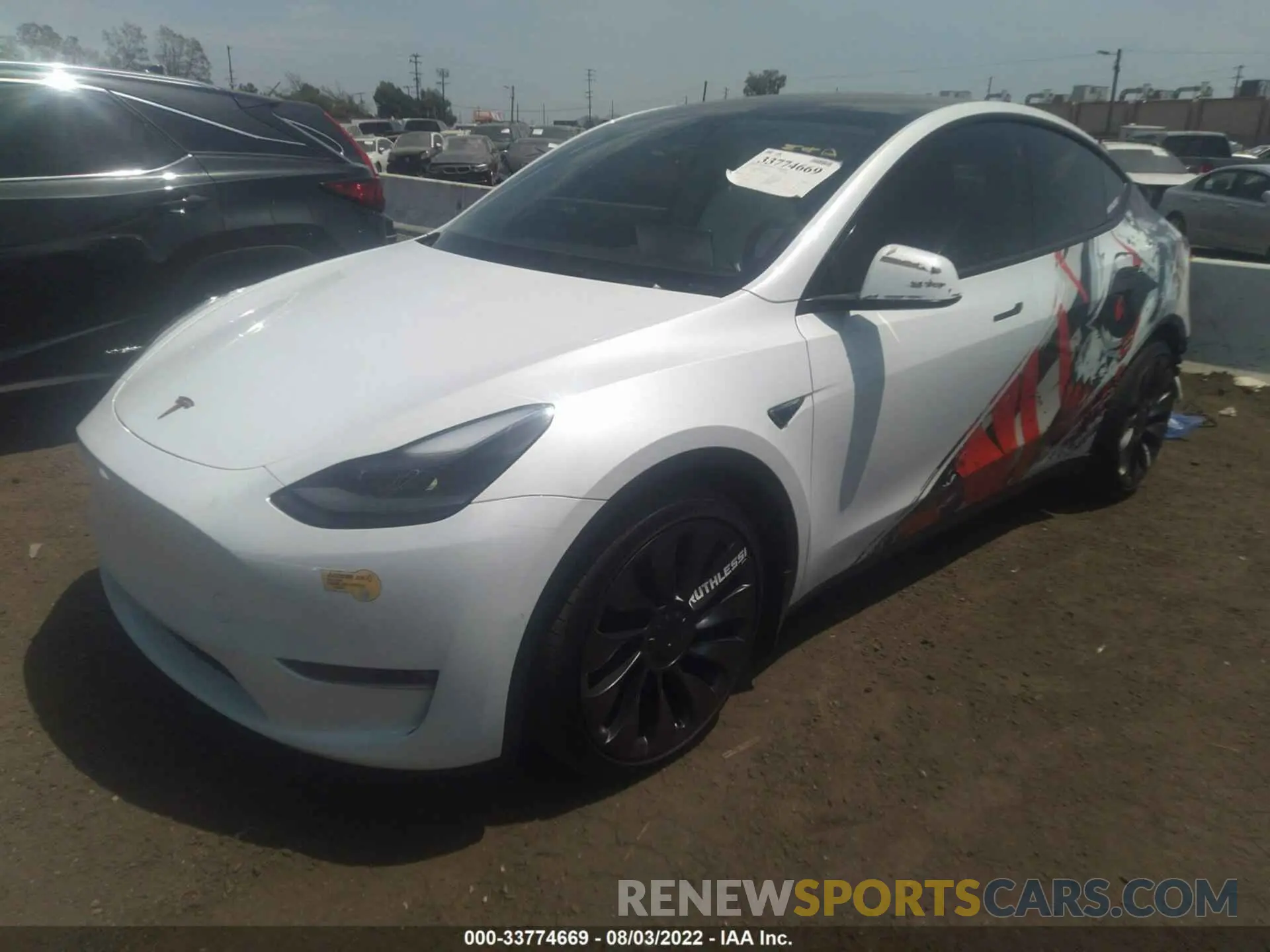 2 fotografías del automóvil dañado 7SAYGDEF3NF326261 TESLA MODEL Y 2022