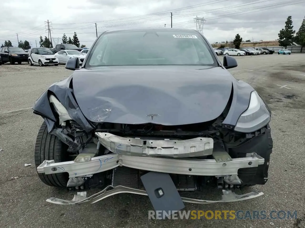 5 fotografías del automóvil dañado 7SAYGDEF3NF410242 TESLA MODEL Y 2022