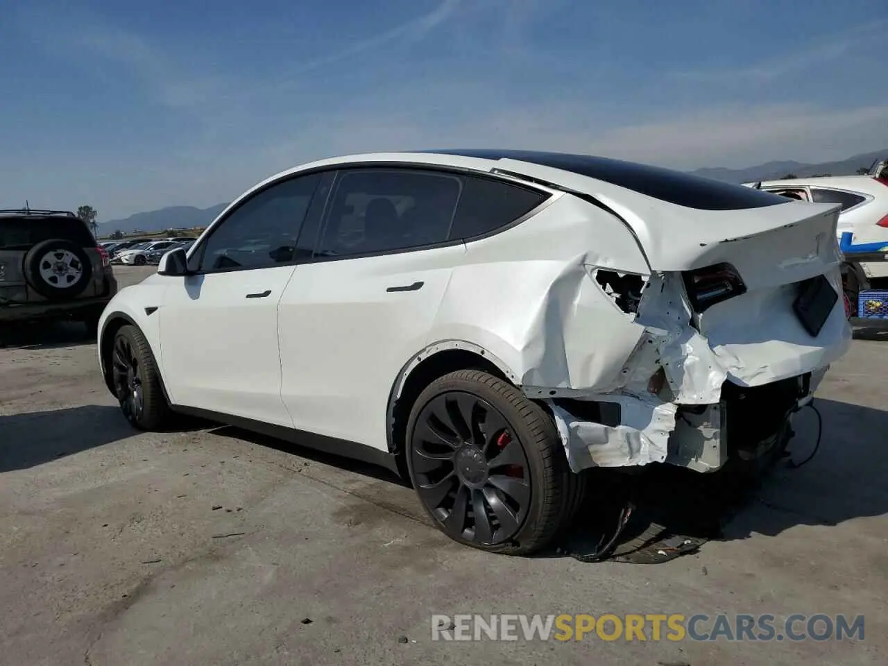 2 fotografías del automóvil dañado 7SAYGDEF5NF456543 TESLA MODEL Y 2022