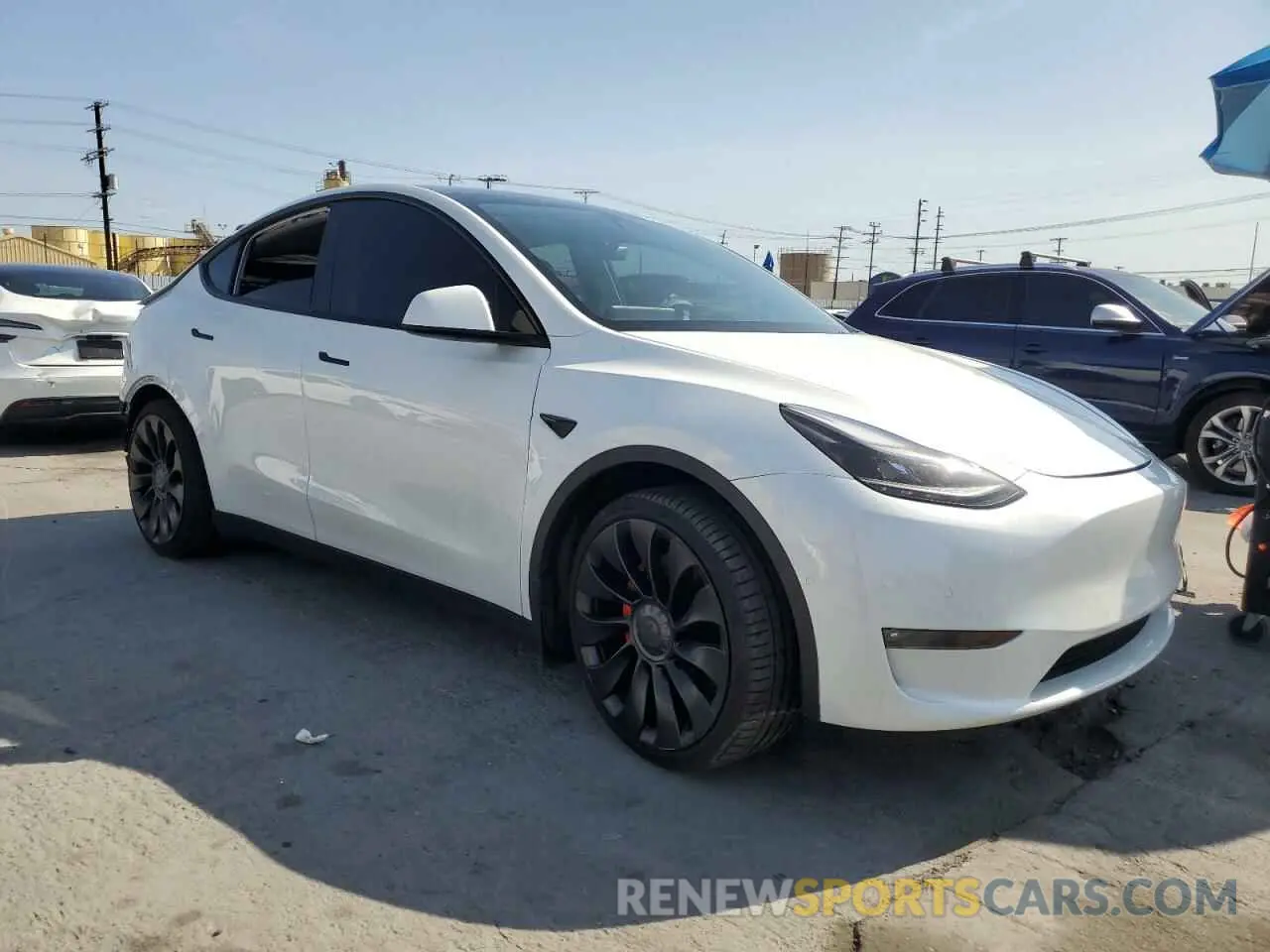 4 fotografías del automóvil dañado 7SAYGDEF5NF456543 TESLA MODEL Y 2022