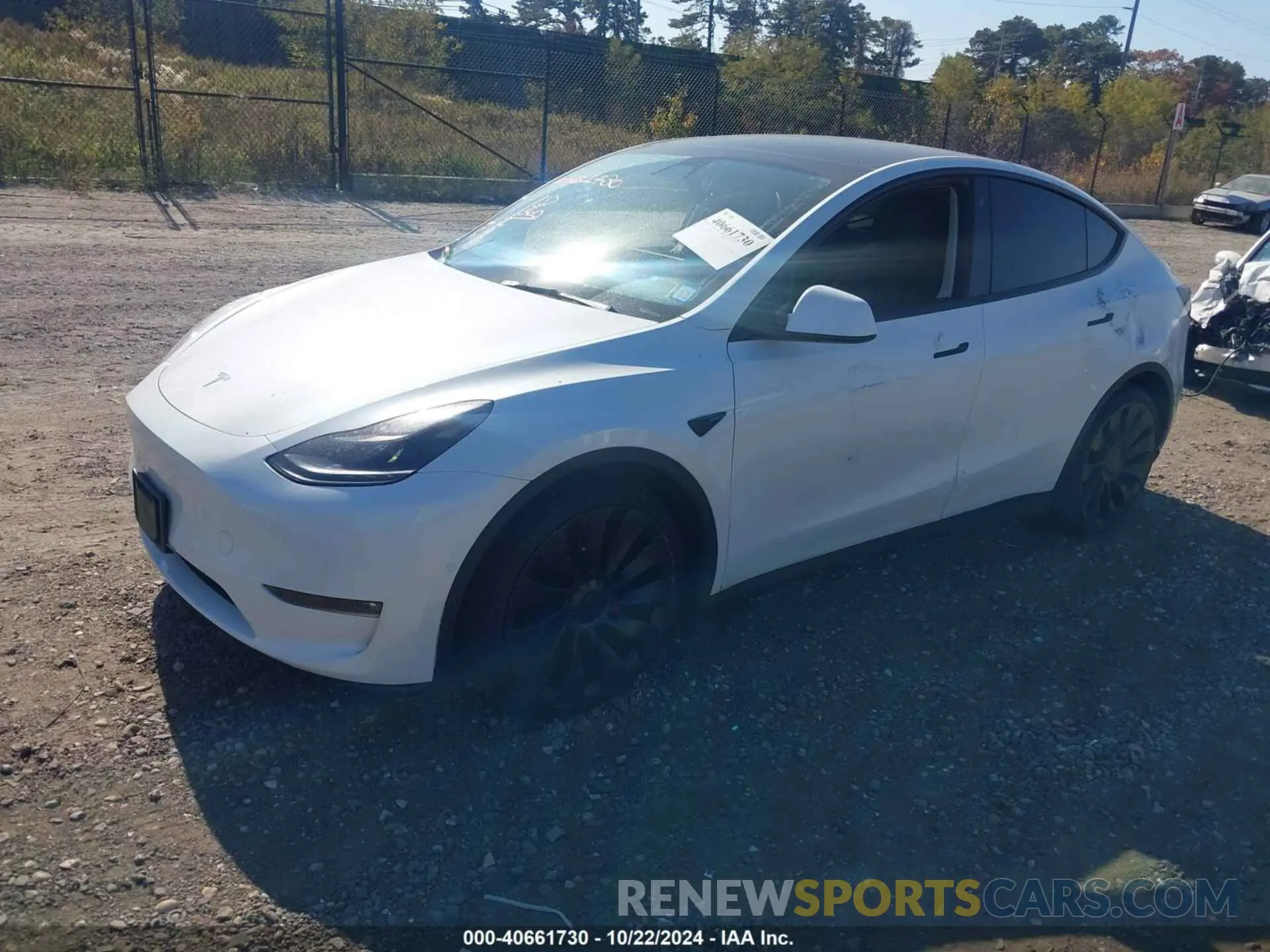 2 fotografías del automóvil dañado 7SAYGDEF6NF467860 TESLA MODEL Y 2022
