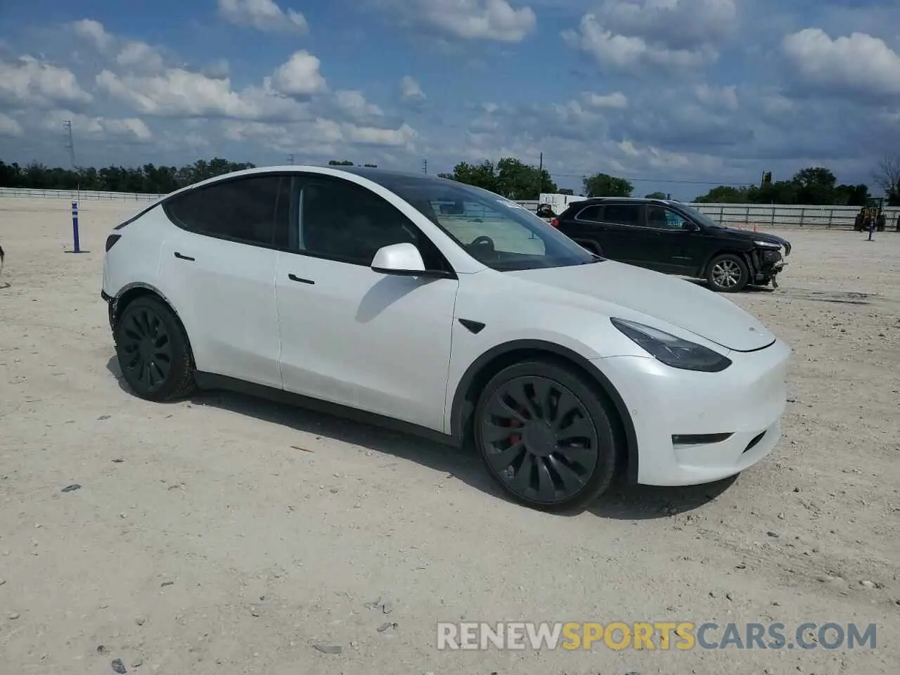 4 fotografías del automóvil dañado 7SAYGDEF6NF540029 TESLA MODEL Y 2022