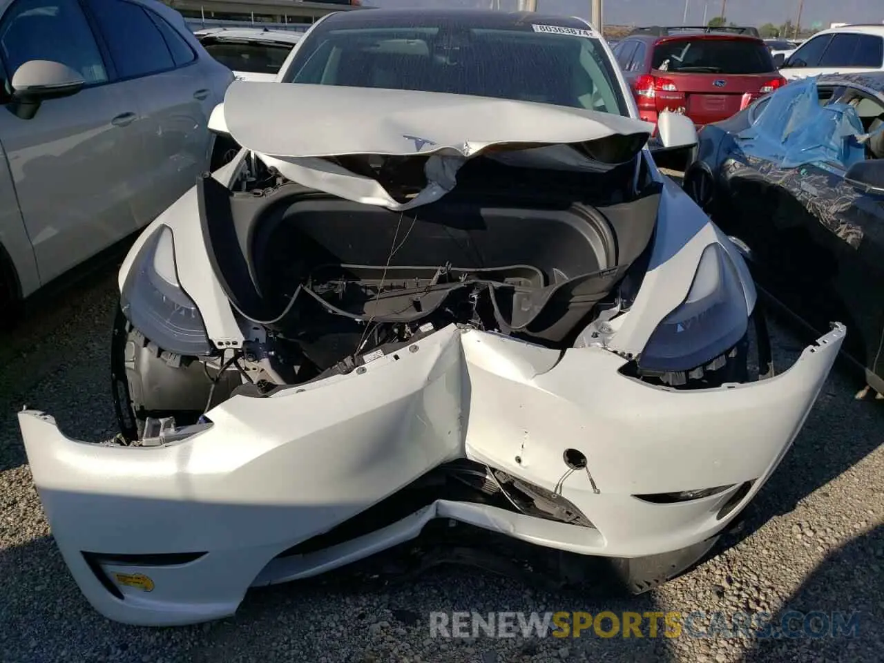 5 fotografías del automóvil dañado 7SAYGDEF9NF389591 TESLA MODEL Y 2022