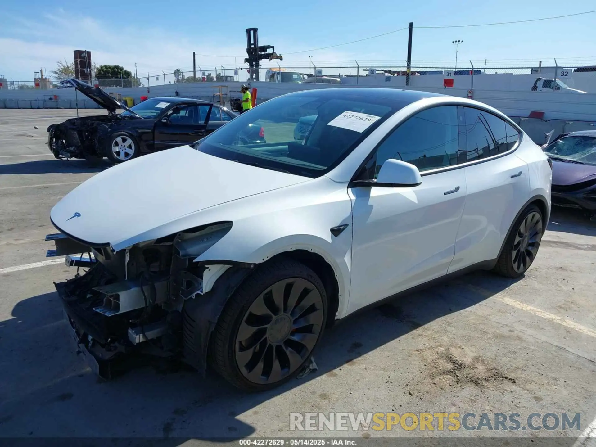 2 fotografías del automóvil dañado 7SAYGDEF9NF391177 TESLA MODEL Y 2022