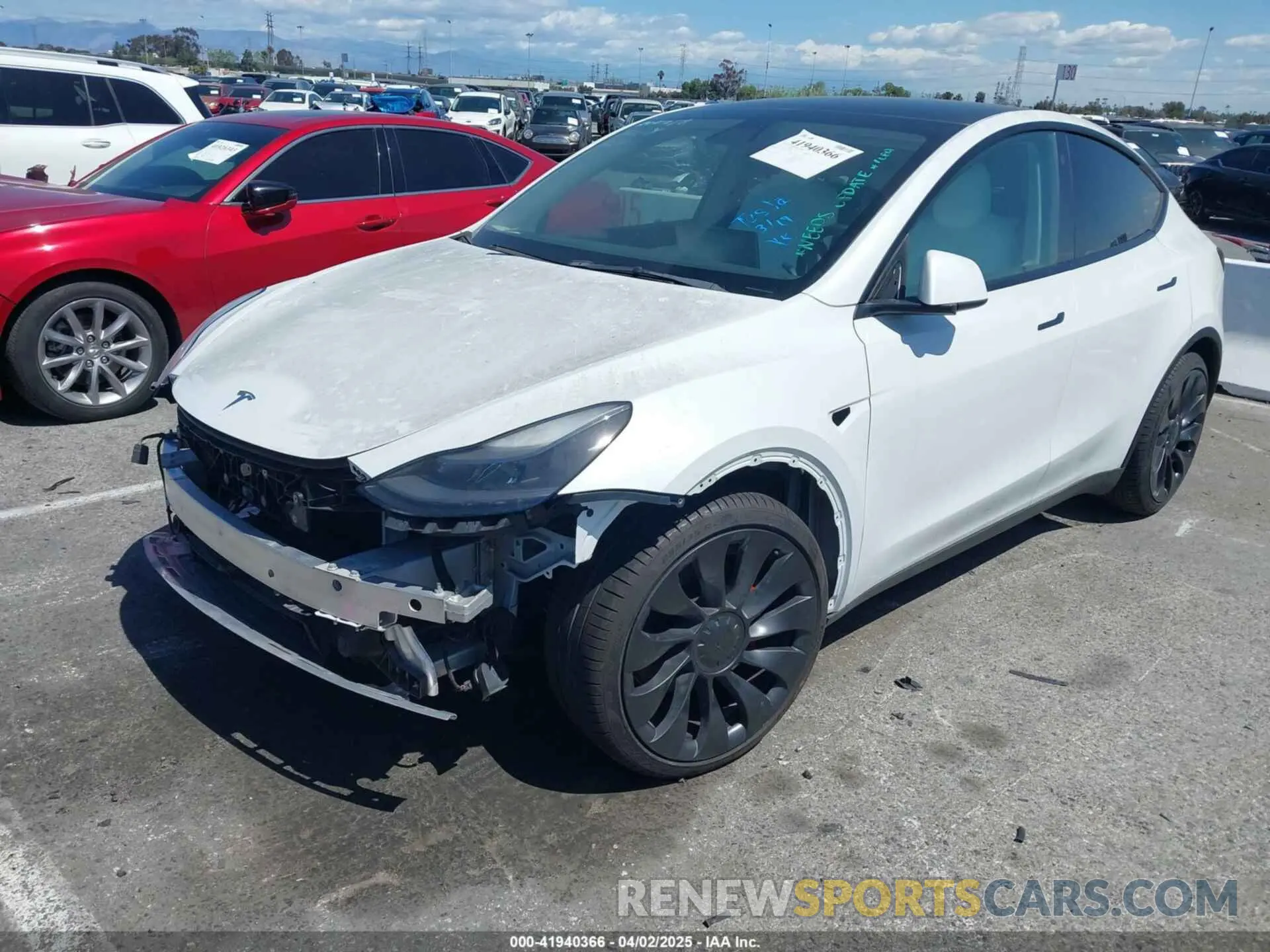 2 fotografías del automóvil dañado 7SAYGDEF9NF407636 TESLA MODEL Y 2022