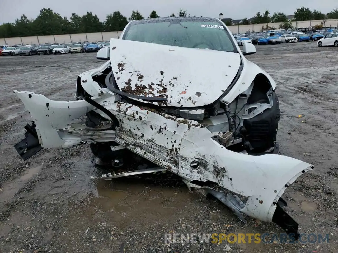 5 fotografías del automóvil dañado 7SAYGDEF9NF523483 TESLA MODEL Y 2022