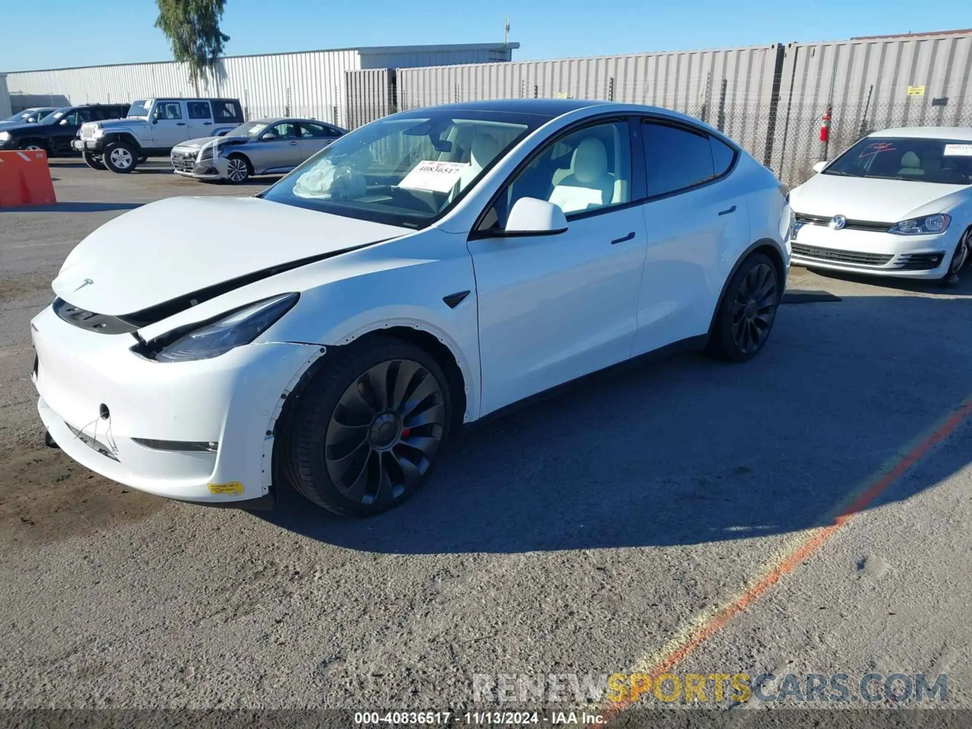 2 fotografías del automóvil dañado 7SAYGDEF9NF563983 TESLA MODEL Y 2022