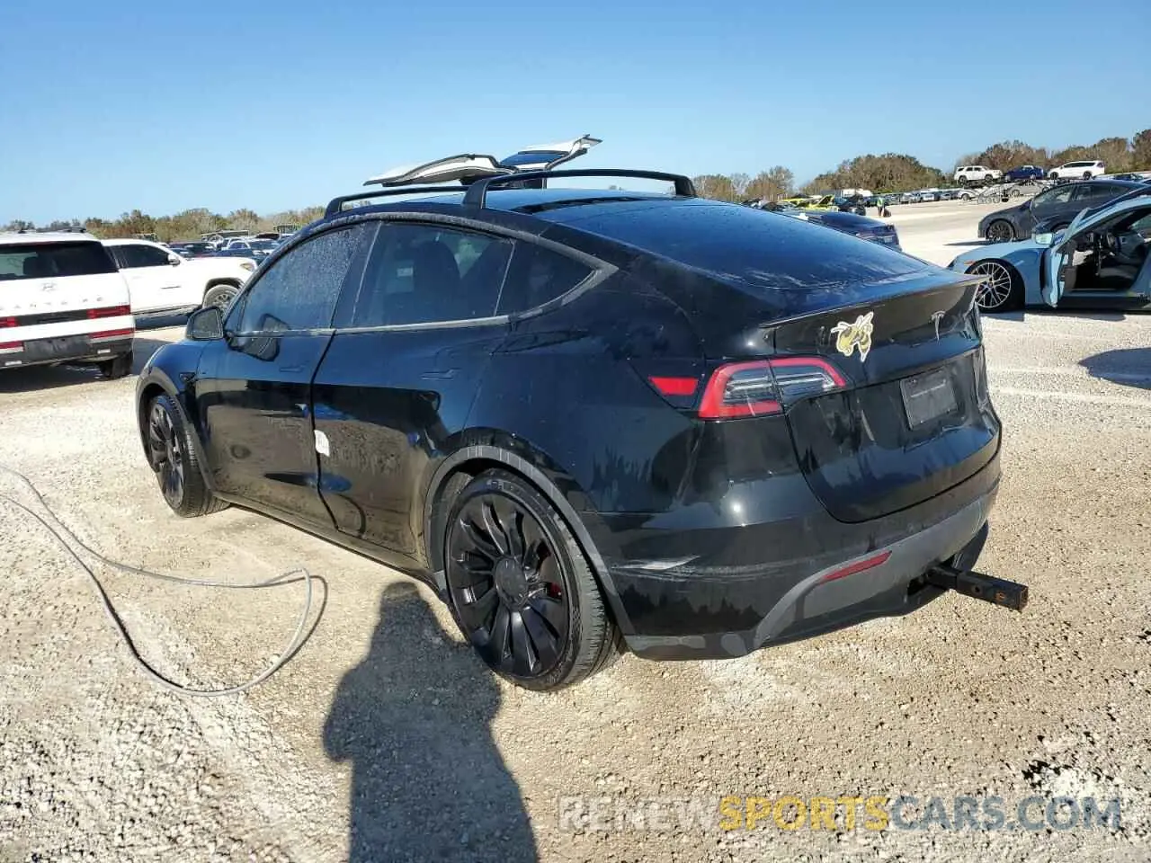 2 fotografías del automóvil dañado 7SAYGDEFXNF375487 TESLA MODEL Y 2022
