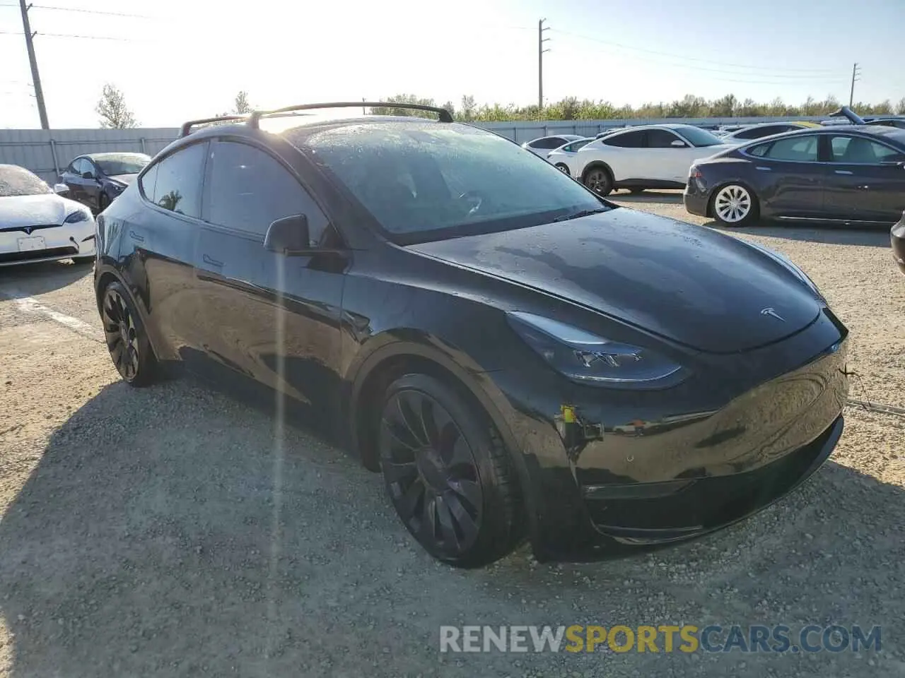 4 fotografías del automóvil dañado 7SAYGDEFXNF375487 TESLA MODEL Y 2022
