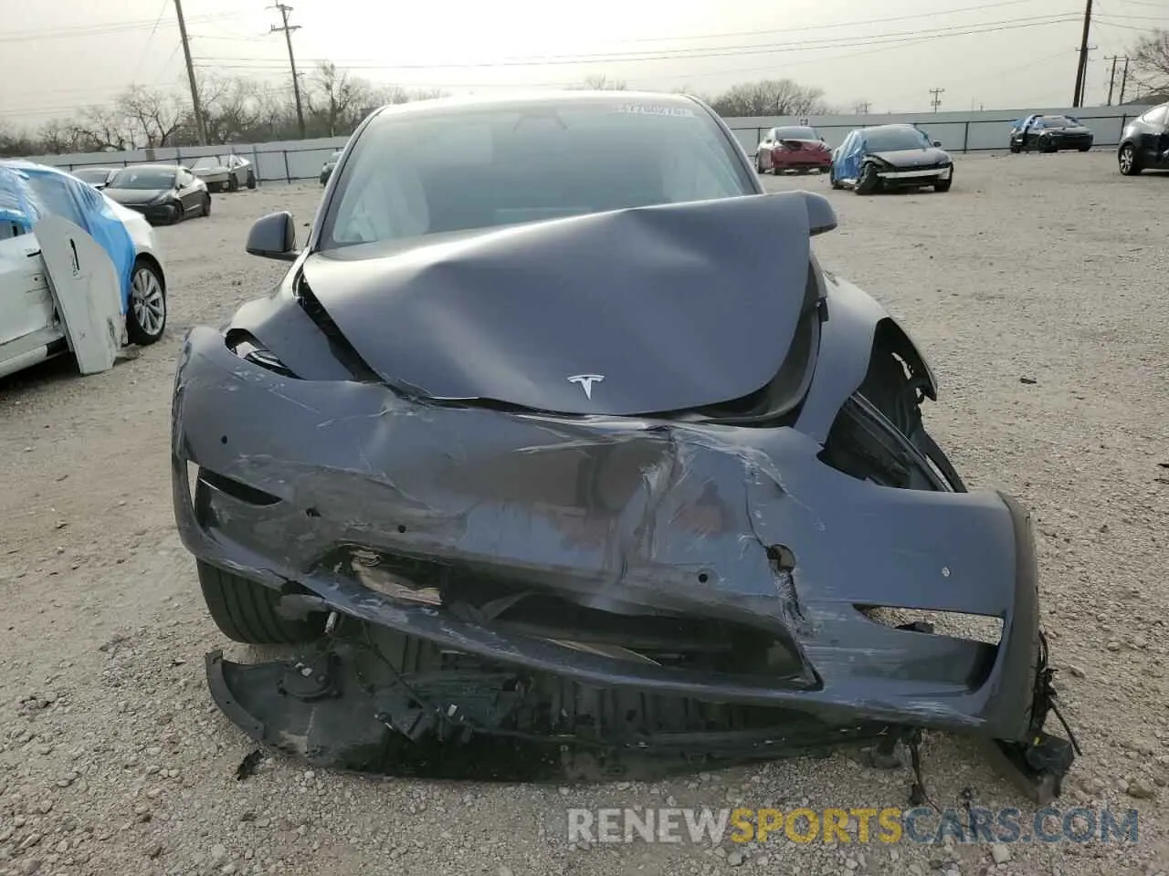 5 fotografías del automóvil dañado 7SAYGDEFXNF388594 TESLA MODEL Y 2022