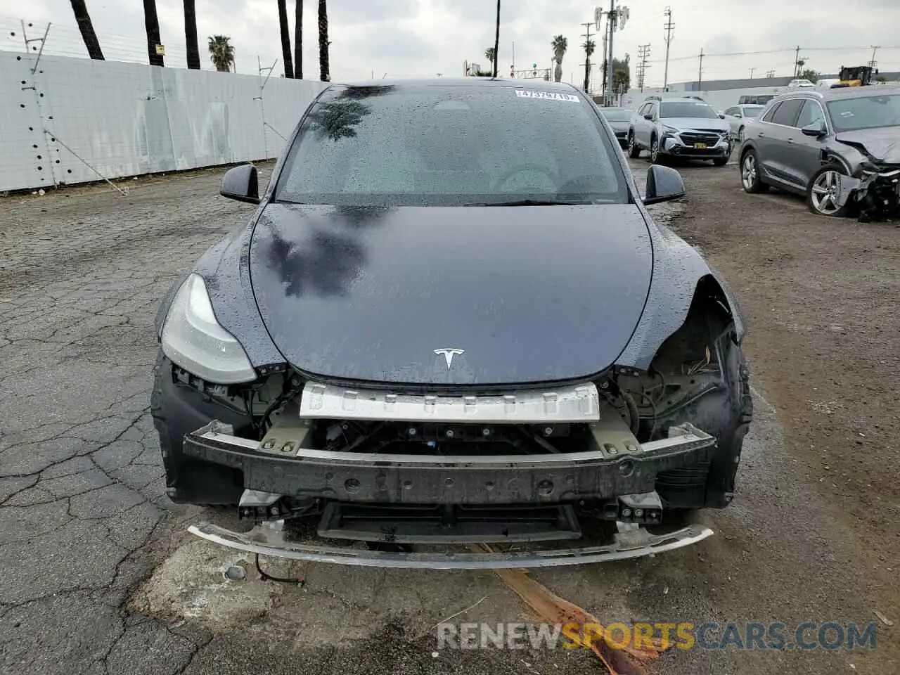 5 fotografías del automóvil dañado 7SAYGDEFXNF554483 TESLA MODEL Y 2022