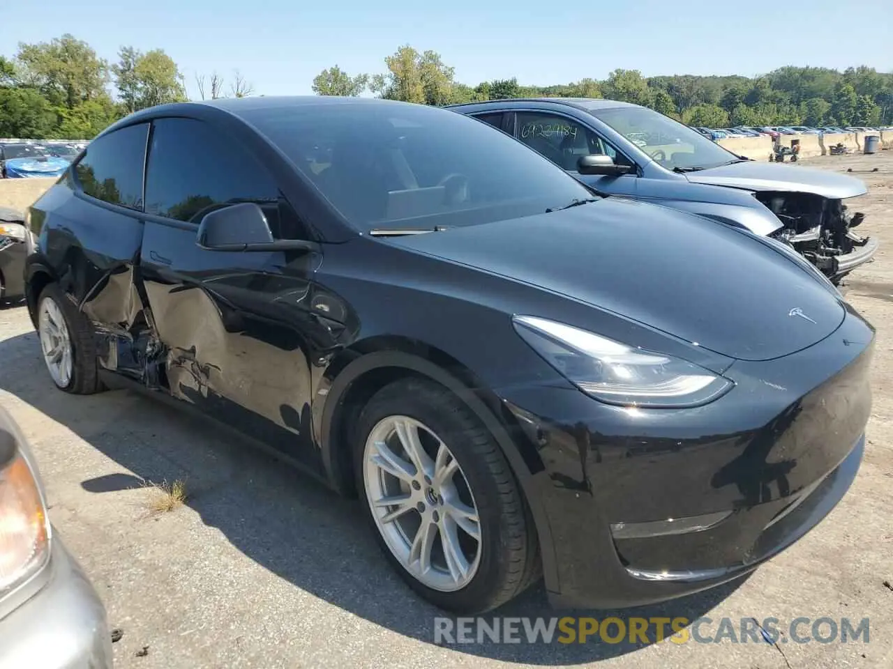 4 fotografías del automóvil dañado 7SAYGAEE0PF925563 TESLA MODEL Y 2023