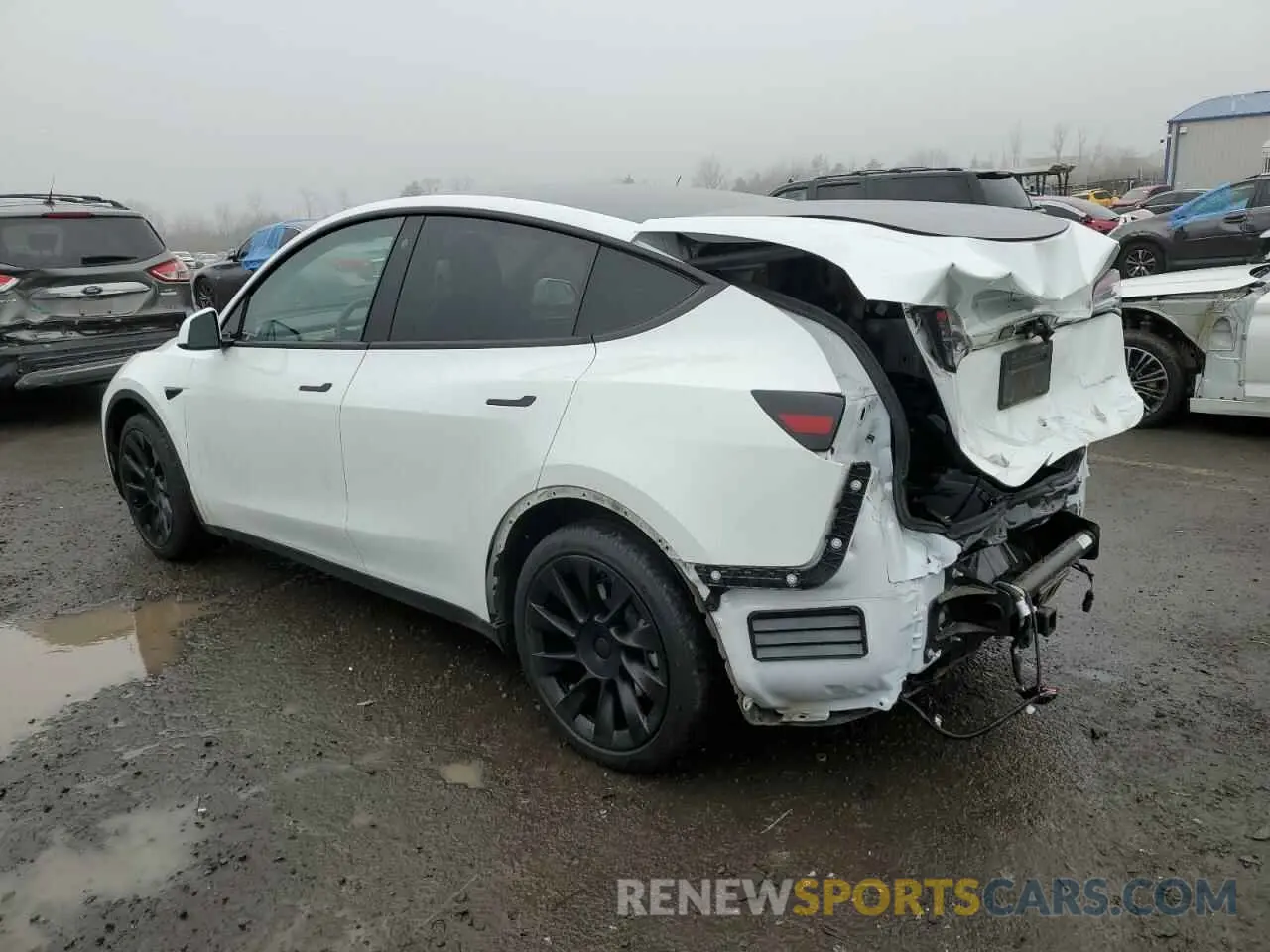 2 fotografías del automóvil dañado 7SAYGAEE1PF673984 TESLA MODEL Y 2023