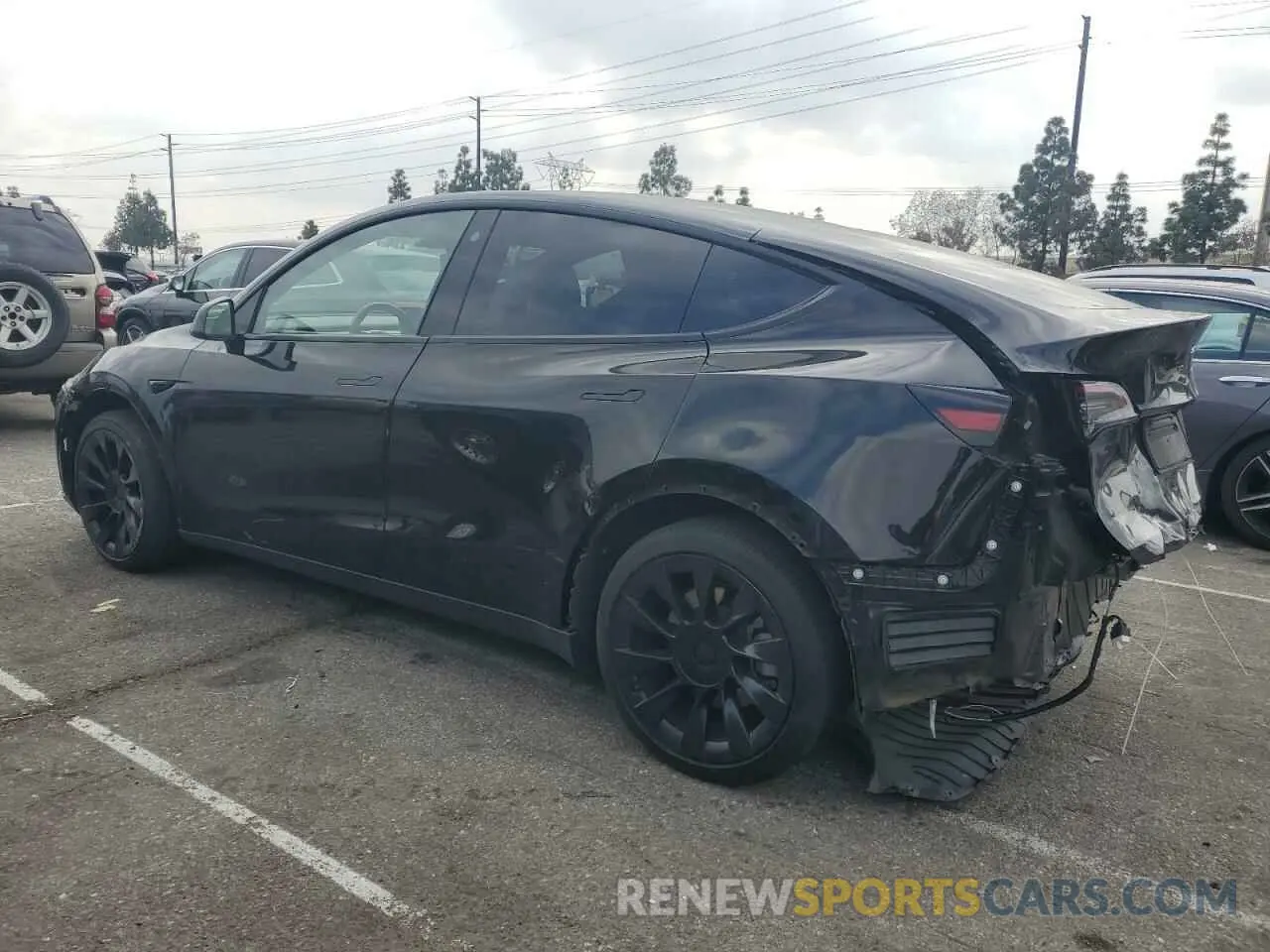 2 fotografías del automóvil dañado 7SAYGAEE1PF698125 TESLA MODEL Y 2023