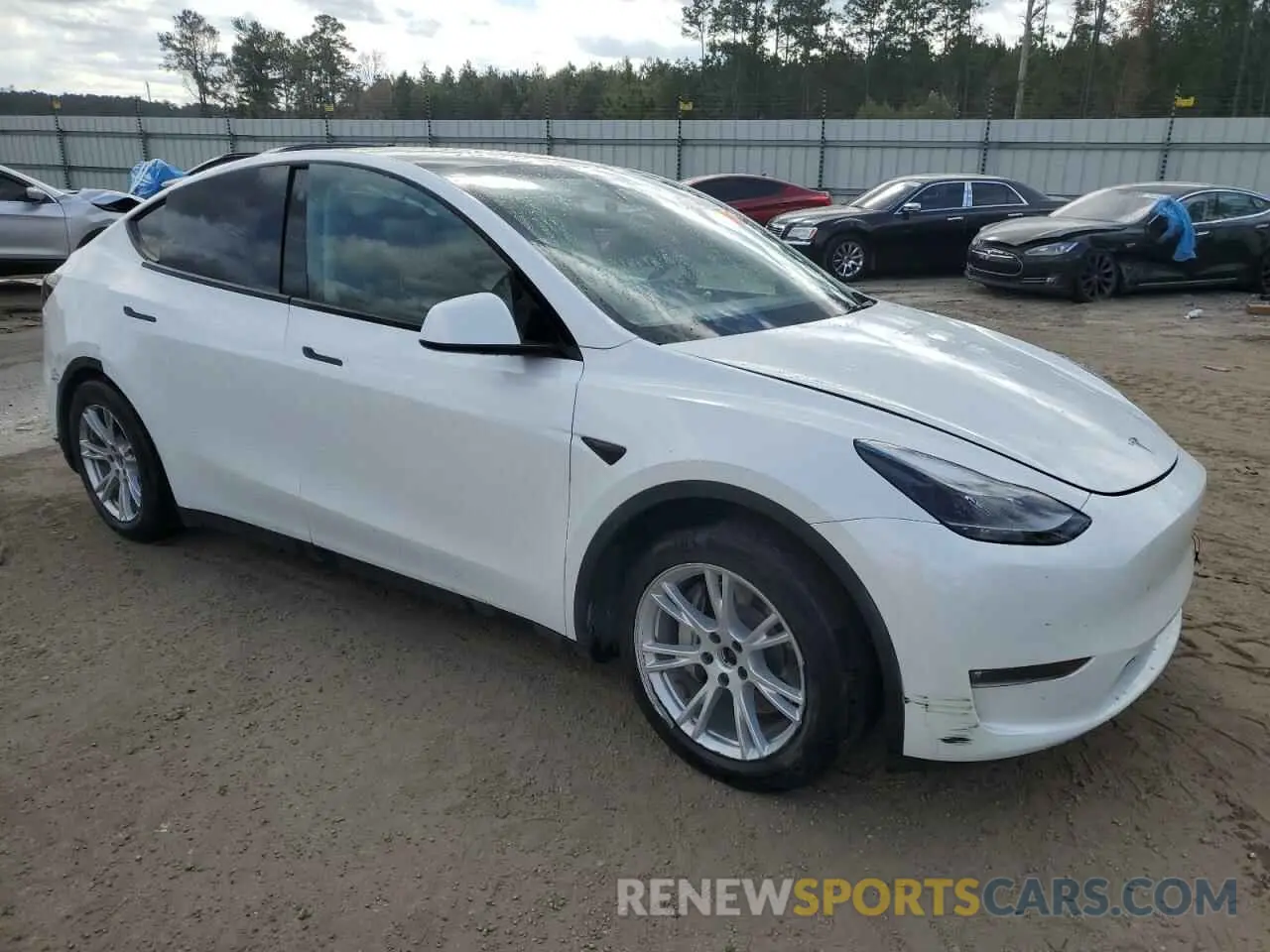 4 fotografías del automóvil dañado 7SAYGAEE2PF607427 TESLA MODEL Y 2023