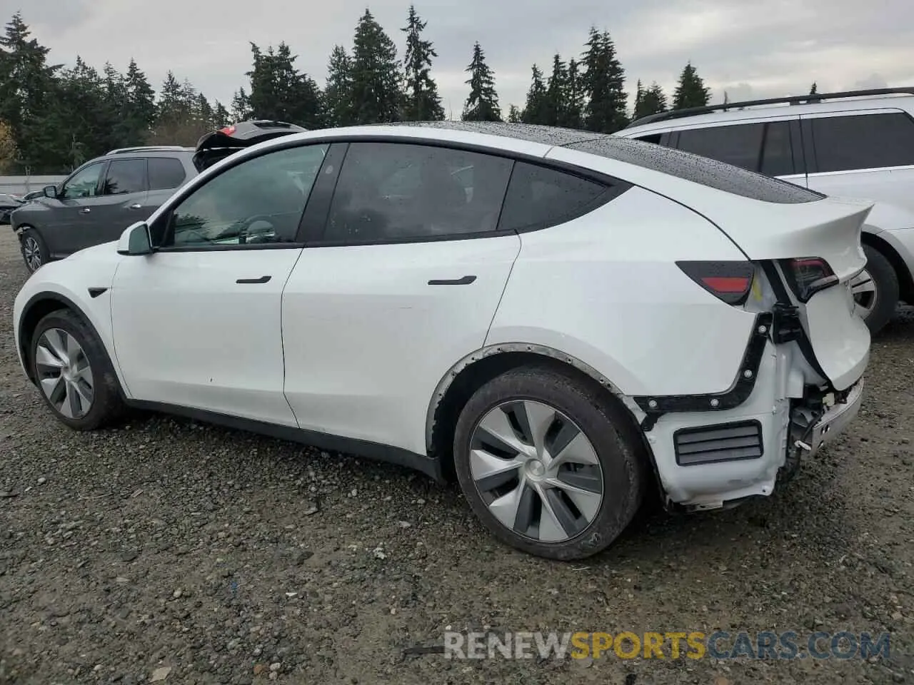 2 fotografías del automóvil dañado 7SAYGAEE3PF811654 TESLA MODEL Y 2023