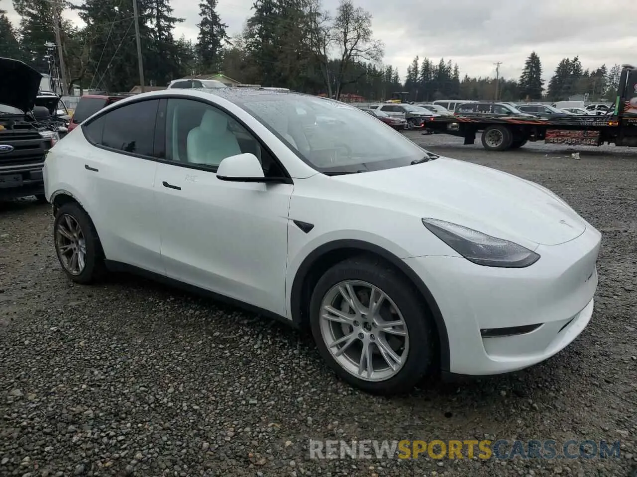 4 fotografías del automóvil dañado 7SAYGAEE3PF811654 TESLA MODEL Y 2023