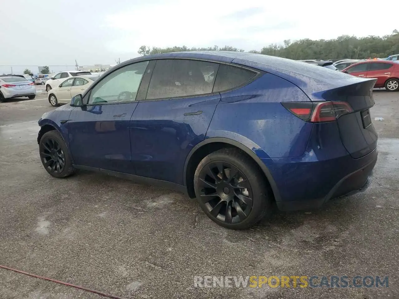2 fotografías del automóvil dañado 7SAYGAEE3PF842256 TESLA MODEL Y 2023