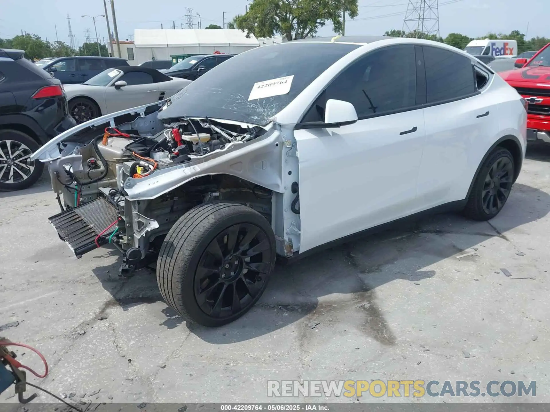 2 fotografías del automóvil dañado 7SAYGAEE3PF907784 TESLA MODEL Y 2023